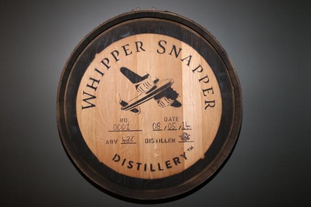 Whipper Snapper whiskey barrel with logo