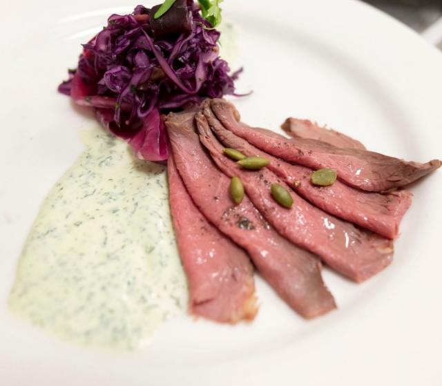 Smoked mutton round with purple salad and creamy fetta sauce. [Source: William Angliss, 2018]