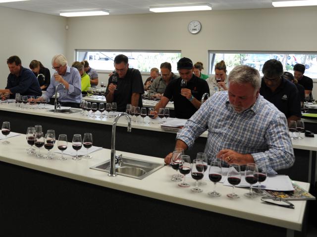 Workshop attendees tasting Cabernet clonal trial wines