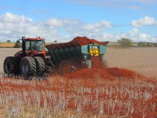 A multi-spreader applies clay to a sandy paddock near Moora as part of a DAFWA project to examine the production and economic benefits of claying.