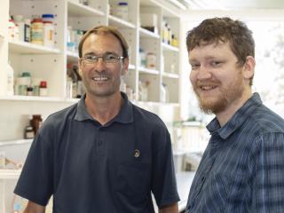 DPIRD Grains R&D Post Graduate Scholarship recipients Martin Harries and Andrew Phillips pictured in a laboratory
