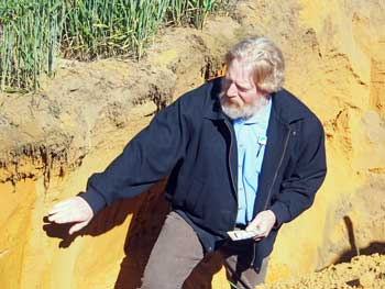 Photo caption: DAFWA senior researcher Chris Gazey points out an acidic sub-surface to growers at a field day in Mingenew.