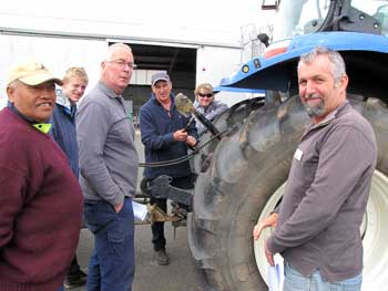 SWIT Lecturer Andrew Pound (front right) watches Department of Agriculture and Food technical officer Graham Blincow (at rear) conduct tractor training with course participants.