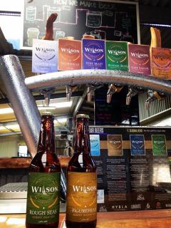 Wilson Brewing Company beer bottles on bar
